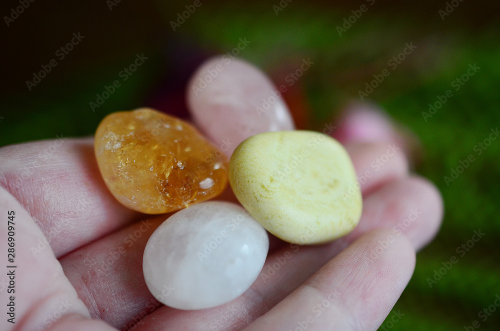 Positivity Crystals, Mindfulness. Tumbled Crystal Bundle: Rose Quartz, Citrine, Serpentine, and Milky Quartz. Energy Spring Cleaning. Variety of healing crystals, pastel colors in natural lighting Positivity Crystals, Mindfulness. Tumbled Crystal Bundle: Rose Quartz, Citrine, Serpentine, and Milky Quartz. Energy Spring Cleaning. Variety of healing crystals, pastel colors in natural lighting