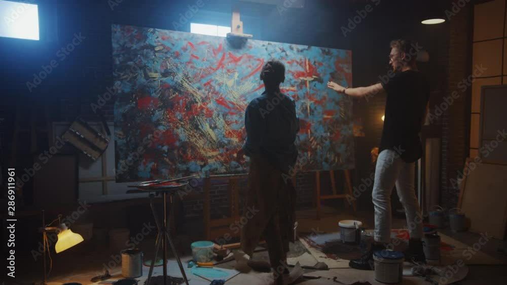 In the Art Class: Talented Young Woman Artist Paints with a Brush on ...