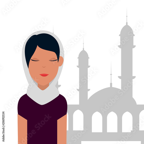 islamic woman with traditional burka and mosque building