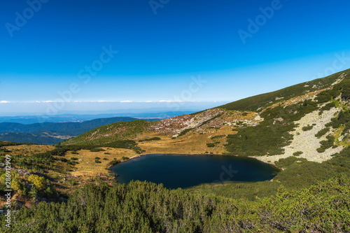 Mountain summer landscape panoramic view with beautiful Yonchevo lake, Rila national park, Bulgaria