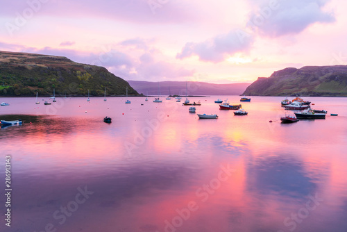Pink sunset on the lake photo