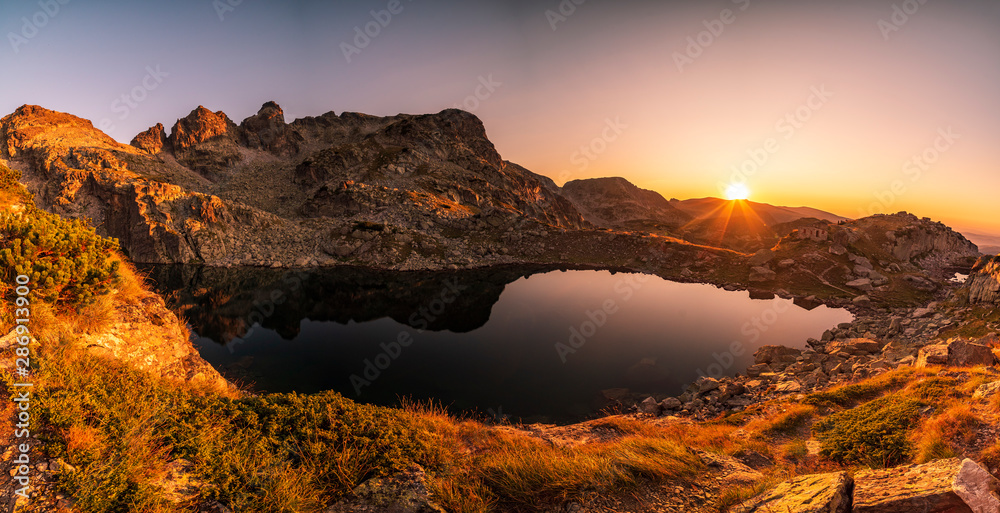 Amazing landscape of The Scary lake during warm summer sunset, Rila mountain national park, Bulgaria