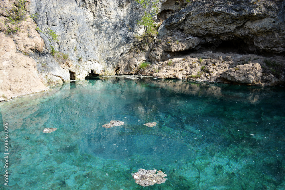Natural Hot Springs with Vivid Green Water