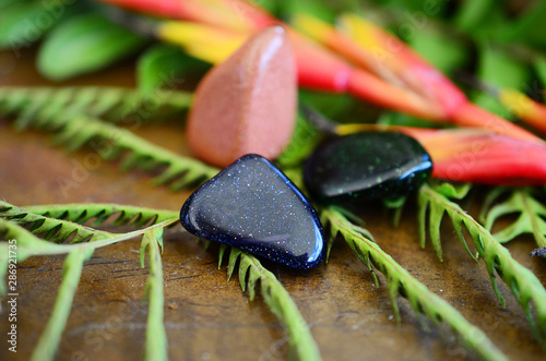 Tumbled Red Goldstone, Blue Goldstone, and Green Goldstone! Sparkling healing crystals, magical witchy stones for reiki healing and energy work! Rainbow of tumbled stones natural lighting photoagraphy
