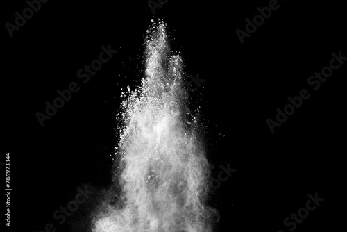 White powder explosion on black background. 