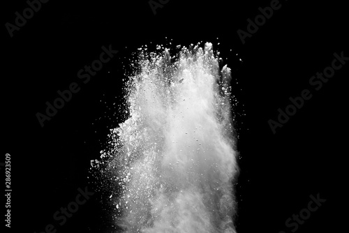 White powder explosion on black background. 