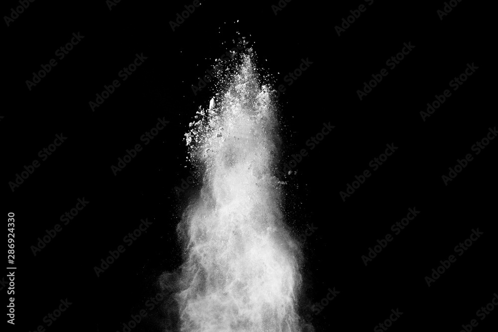 White powder explosion on black background. White powder explosion on black background.