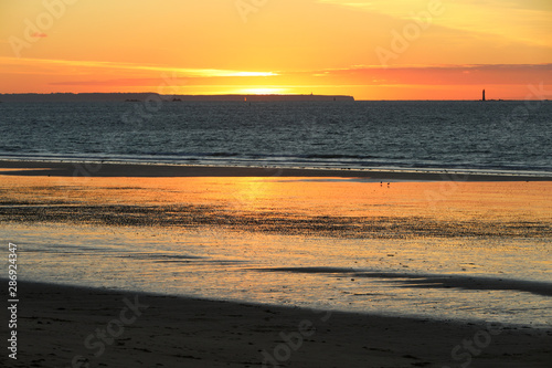 Beauty sunset view from beach in Saint Malo, Brittany, France © wjarek