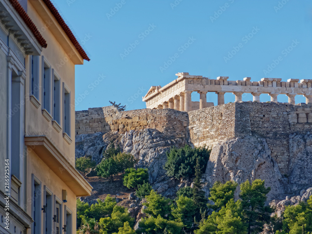 Athens Greece, unusual view of Parthenon ancient temple from the street behind acropolis hill