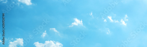 Panorama Blue sky in the soft white clouds. Natural cloudscape background in gentle tones
