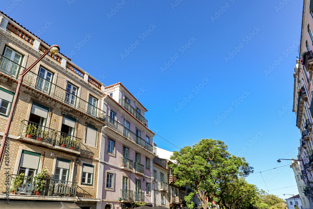 View to the Bairro Alto district in the historic center of Lisbon, traditional facades in the streets of the old town, Portugal Europe