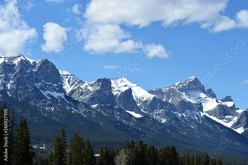 Snow-covered Rocky Mountains on a Summer Day