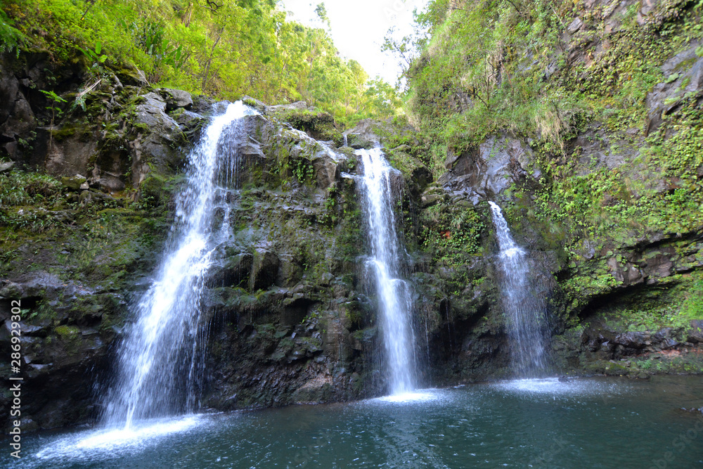 Tropical Pacific Island Waterfalls with Natural Pools Tropical Pacific Island Waterfalls with Natural Pools