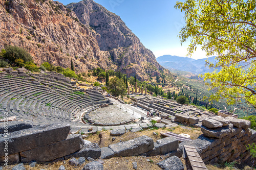 The amphitheater and the temple of Apollo in Delphi, Greece photo