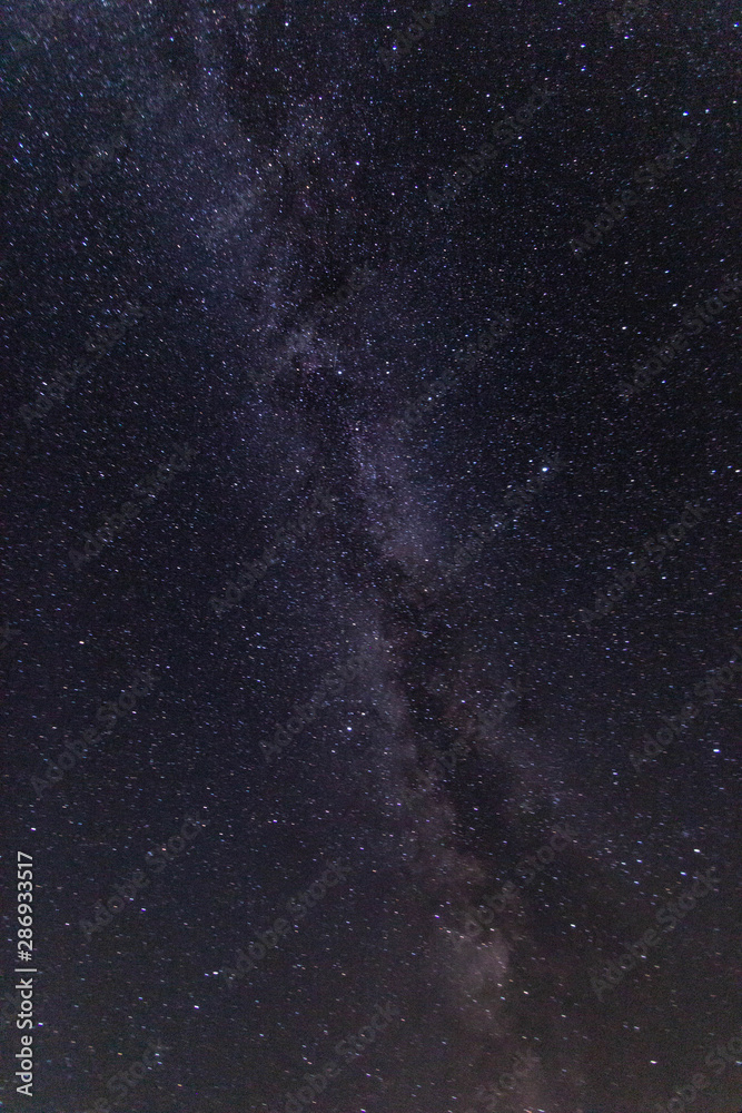 Fototapeta premium milky way dark night filmed in a Russian village