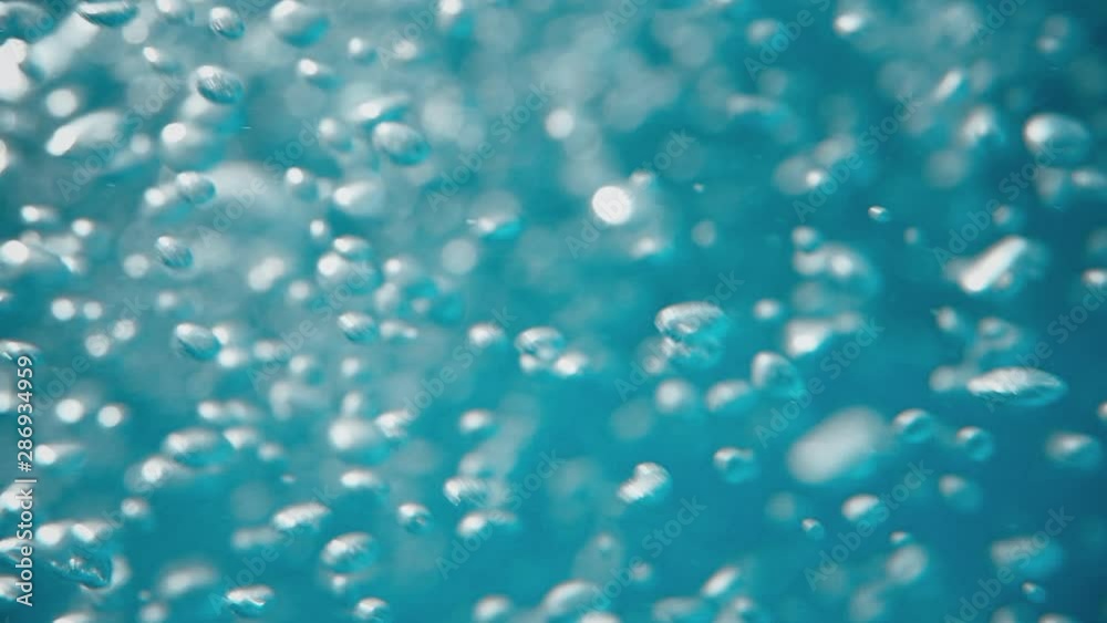 Bubbles rising to the surface. Air bubbles in water in sea (underwater shot), good for backgrounds. Slow motion. Bubbles rising to the surface. Air bubbles in water in sea (underwater shot), good for backgrounds. Slow motion.