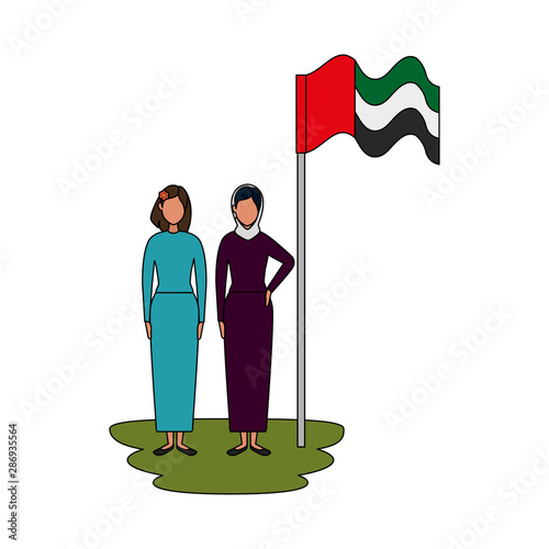 islamic women with traditional burka and arabia flag in pole