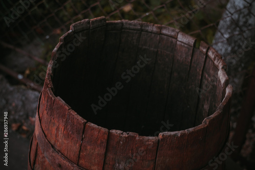 empty wooden barrel. The concept of decline and destruction