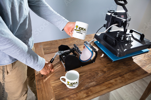 Foto Printing On Mugs In Workshop