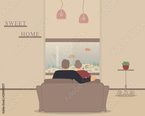 Aquarium with fish as design element for interior of room on cream background.Pair of man and woman sitting hugging and look at the fish tank.Wooden decor letters on shelves: sweet home.Vector