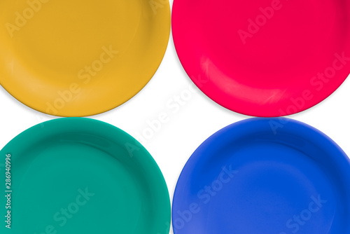 Colorful ceramic round plate. Isolated white background
