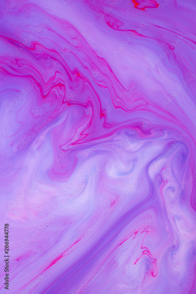 Abstract colored background, fluid design. Stains of paint on the water. Ebru art, marbled paper.