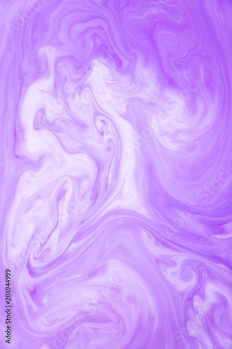 Abstract colored background, fluid design. Stains of paint on the water. Ebru art, marbled paper.