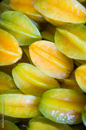 Fresh yellow carambola star fruit on display at Brazilian farmers market in Rio de Janeiro Brazil