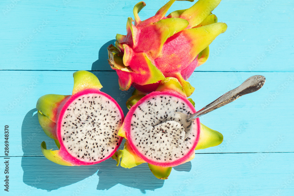 White dragon fruit on blue background White dragon fruit on blue background