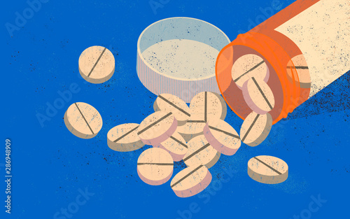 The opioid epidemic. American people deadly addiction. Orange opioid pill bottle. photo