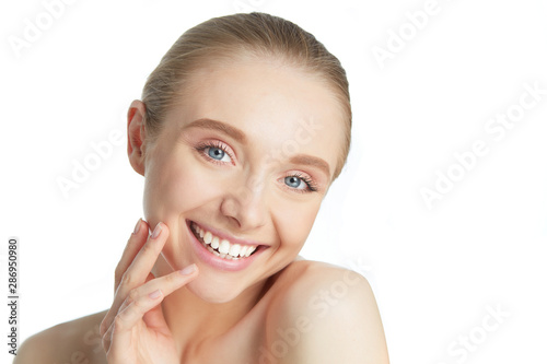 Portrait of beautiful woman with natural make up on white background