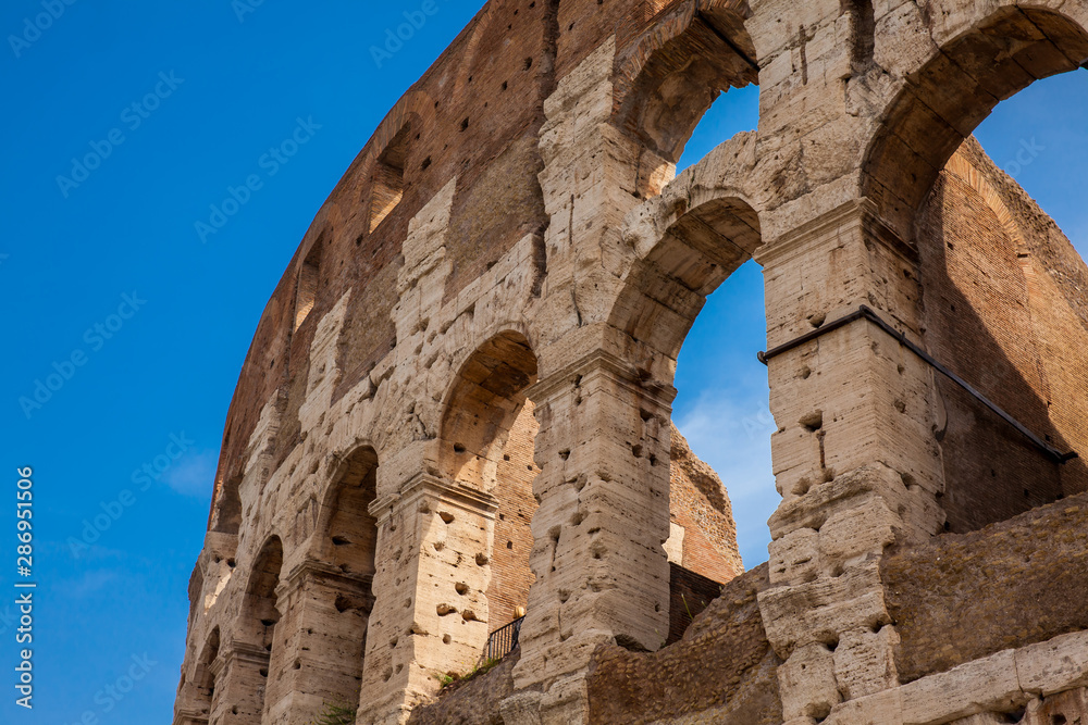 Detail of the  facade of the famous Colosseum or Coliseum also known as the Flavian Amphitheatre in the centre of the city of Rome