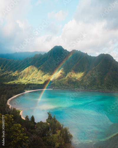 hawaii hike with rainbow and mountains photo