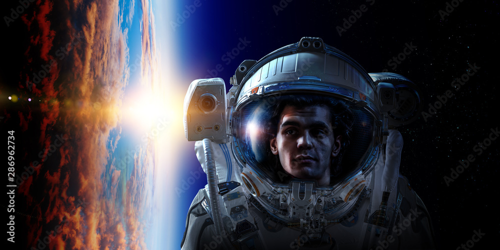Spaceman and planet, human in space concept Spaceman and planet, human in space concept