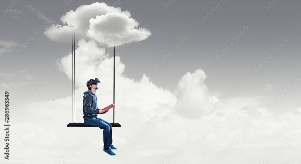 Virtual reality experience, young man in VR glasses Virtual reality experience, young man in VR glasses