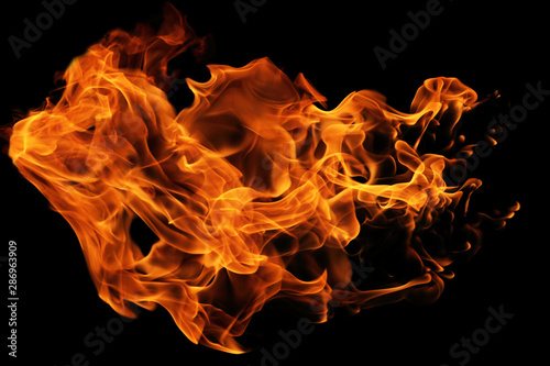 Fire flames isolated on black background, movement of fire flames