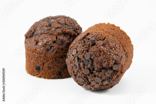 Chocolate muffins on white background