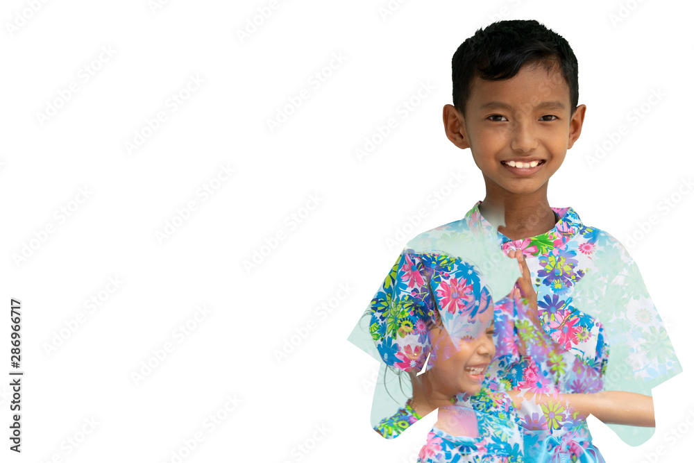 Abstract double exposure, Children dressed in ancient Thai examples for Songkran tradition. The boy stand straight in Thai style. Girls and boys splash water together inside. Abstract double exposure, Children dressed in ancient Thai examples for Songkran tradition. The boy stand straight in Thai style. Girls and boys splash water together inside.