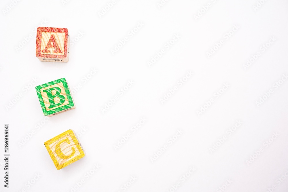 ABC wooden blocks isolated against white ABC wooden blocks isolated against white