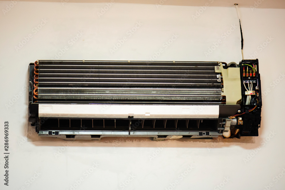 Air conditioner with cover removed, visible inside Air conditioner with cover removed, visible inside