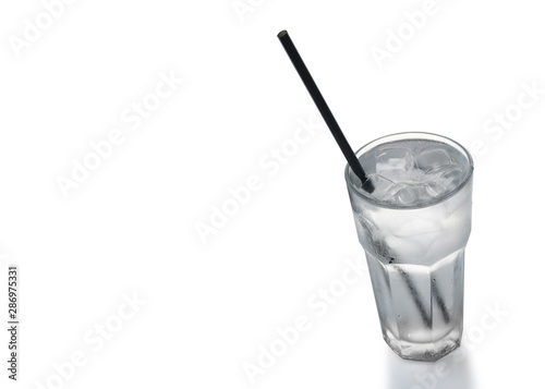 glass of water with ice on white background. Copy space