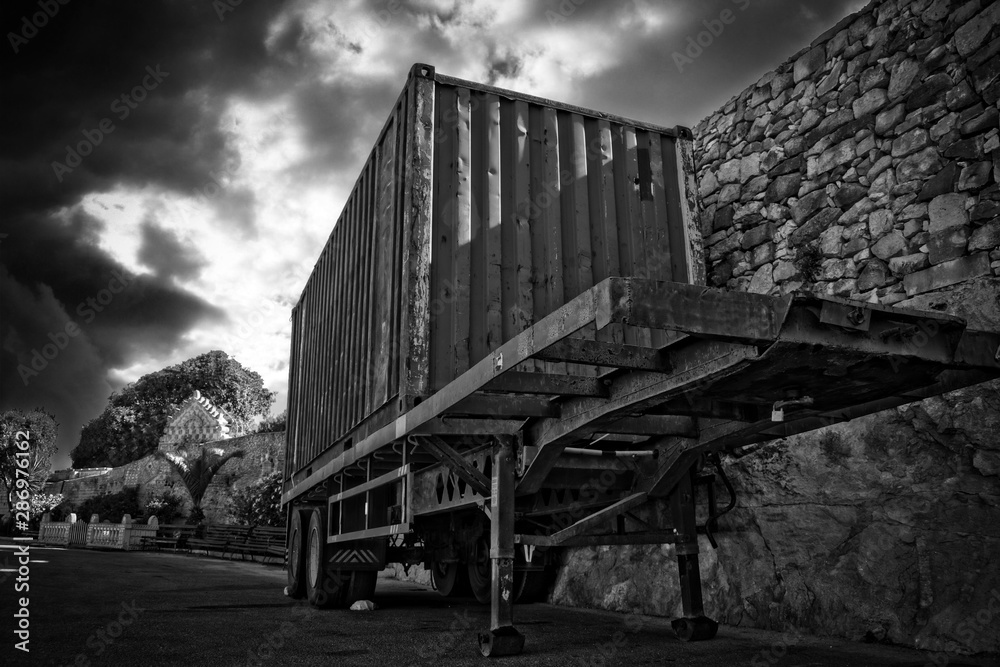 A large abandoned trailed with cargo A large abandoned trailed with cargo