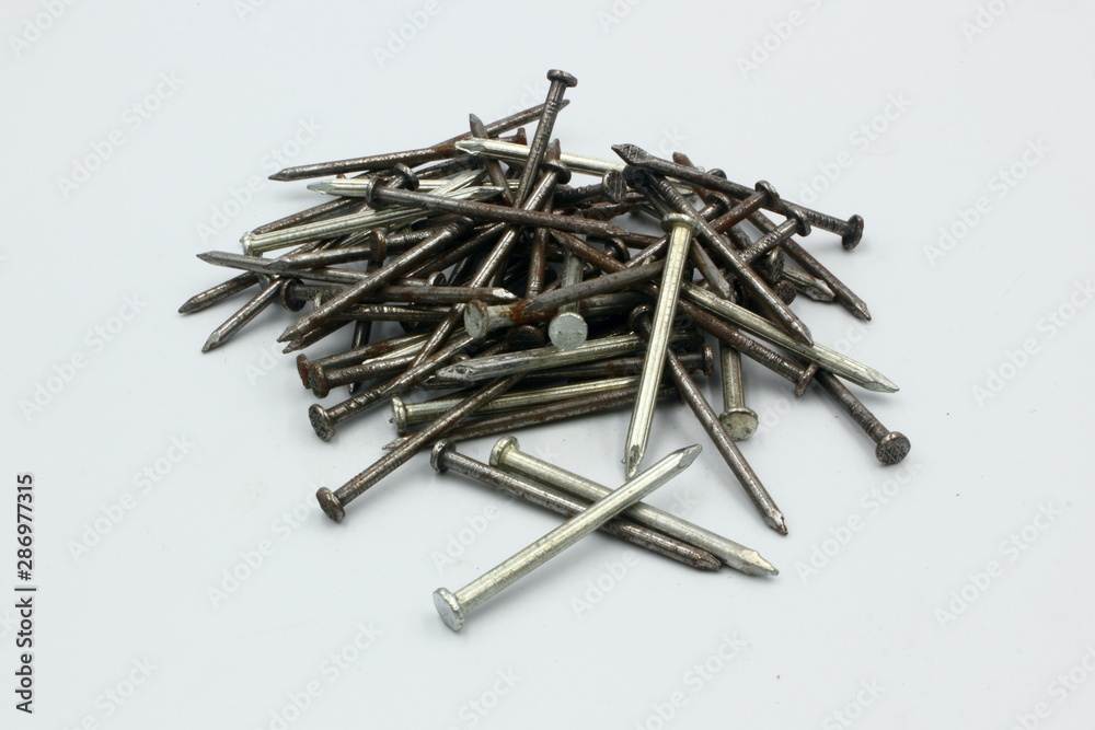 pile of nails isolated on white background pile of nails isolated on white background