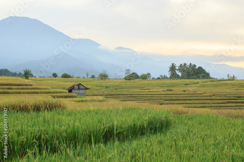 panoramic view of the mountain ranges in the morning when the sun is a beautiful tourist destination in Indonesia