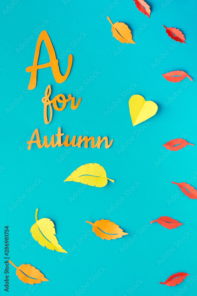 Paper craft, red and yellow Autumn leaves with text 