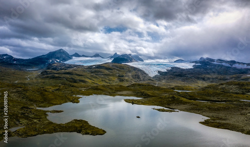 Smørstabbreen glacier with lake Presteinsvatnet in Jotunheimen national park, Norway