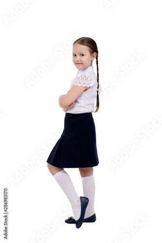 Full length of beauty schoolgirl in first day of school isolated on white background