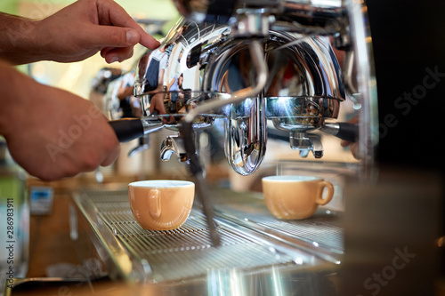 making coffee on coffee maker machine.