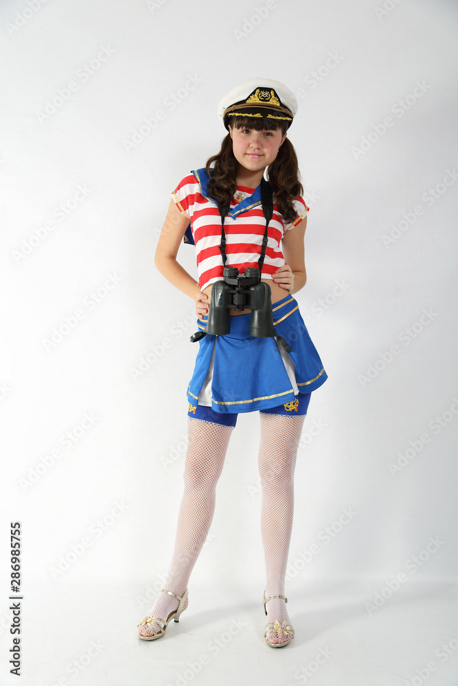 beautiful girl in a sailor suit on a white background
