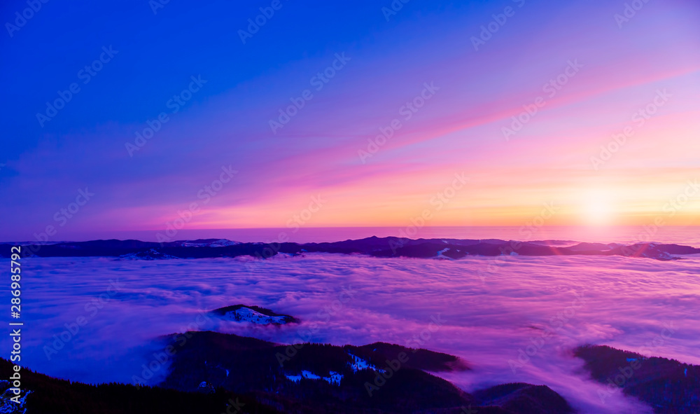 beautiful sunset or sunrise above the clouds. Romania